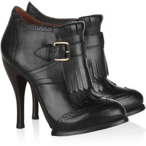 Alexander McQueen let her ankle boots